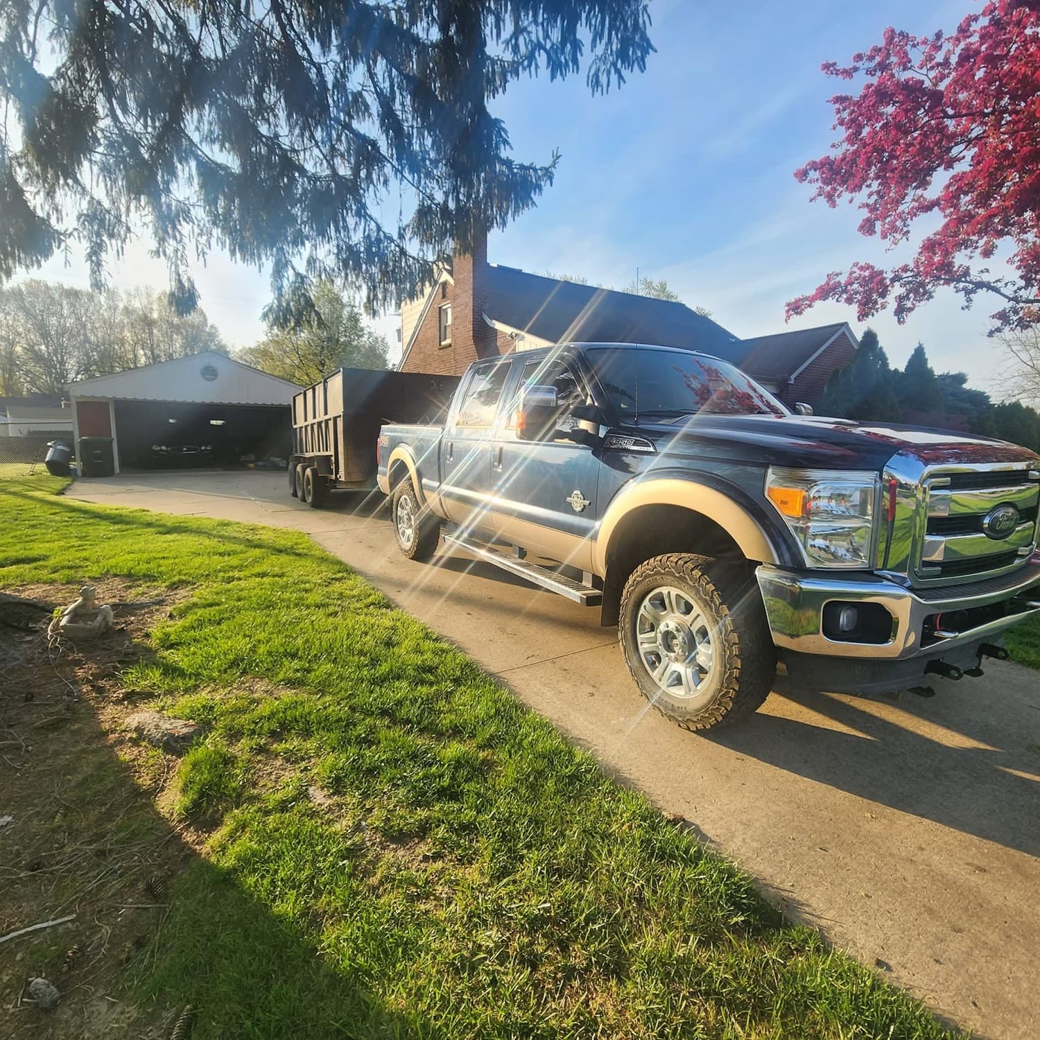30 Yard Dumpster roll-off dumpster in a Southeast Michigan driveway